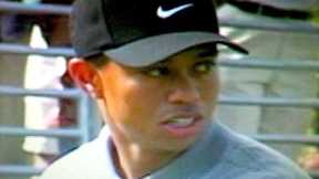 TIGER WOODS gives kids golf tips at his childhood golf course -- 2001