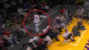 LeBron James hurdles front row fans after hustling for a loose ball | NBA on ESPN