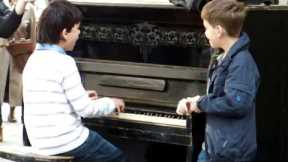 Piano prodigy kid performing on Session street in Lviv