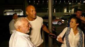 THE ROCK DWAYNE JOHNSON GREETS FANS OUTSIDE OF A RESTAURANT IN BEVERLY HILLS CALIFORNIA