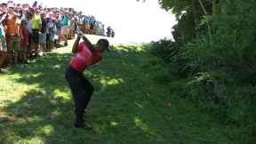 Tiger Woods’ spectacular recovery shot on No. 12 at Quicken Loans