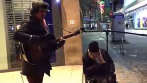 Homeless man joins busker for spontaneous New Year's Eve street jam, the result is incredible