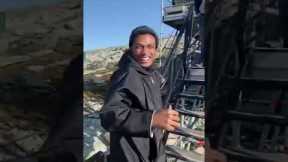 Watch the cast of Mission: Impossible react to Tom Cruise riding a motorbike off a cliff.