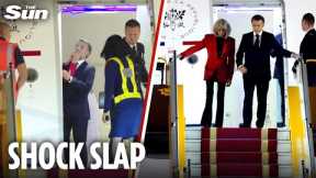 Bizarre moment Emmanuel Macron is SHOVED by wife Brigitte while ‘bickering’ as they got off plane