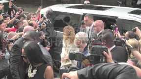 Rihanna gets booed as she arrives at the 2013 Chanel Haute Couture show in Paris