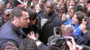 REALLY CRAZY - RIHANNA almost crushed by a sea of fans while entering her hotel in Paris !!!