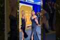 Selena greets her fan warmly , she's