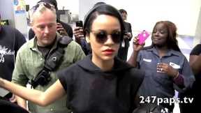 Rihanna arriving through JFK Airport was all Smiles rocking her new hair cut in NEW YORK CITY