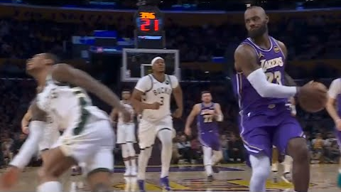 LeBron James looks at KPJ for trying to steal it before dunk vs Bucks 😂