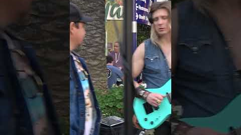 He asks is he can sing Journey Don't Stop Believing