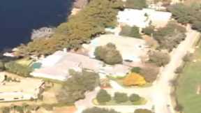 021810 Paparazzi check out Tiger Woods House on helicopter Alequin