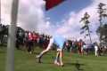 Tiger Woods witnesses the first hole